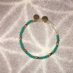 Turquoise and gold Alex and Ani bracelet